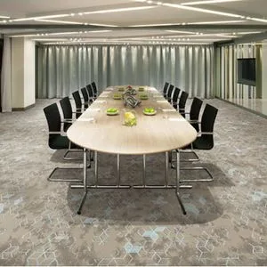 Modular Nylon Carpet Tiles Featuring Unique Connector System Allows Quick Replacement of Damaged Sections Without Disturbing Adjacent Tiles