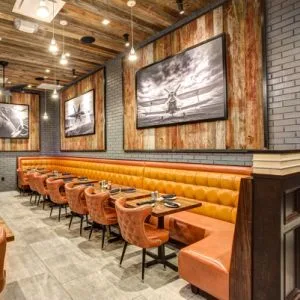 Customized Luxury Club Booth Seating Orange Leather Restaurant Sofa Metal Bar Furniture