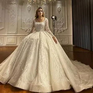 Long Sleeves Bridal Ball Gown Lace Crystals Corset Wedding Dresses 2026 M8215
